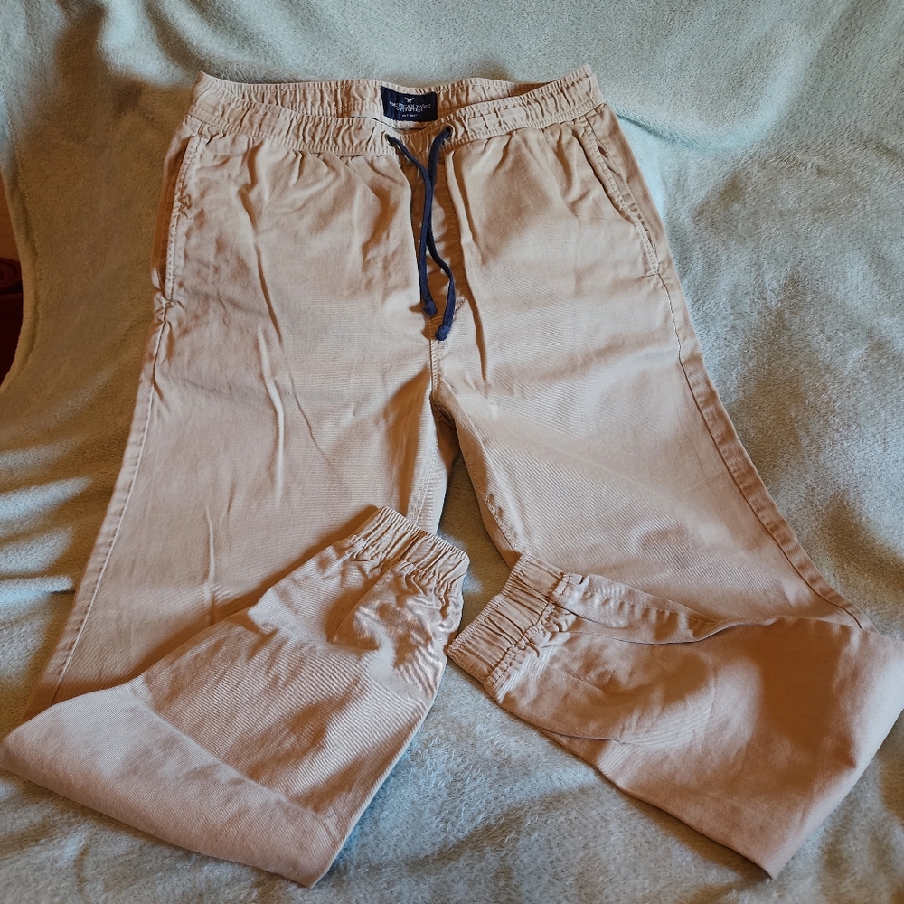 American Eagle men's kaki pants....small...elastic in the bottom...